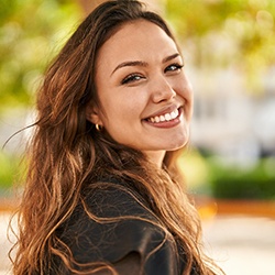 Portrait of smiling, confident young woman