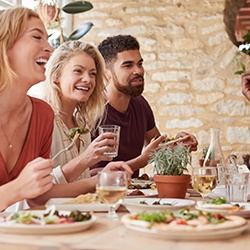 Friends eating food in a restaurant