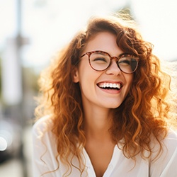 Portrait of smiling woman in the sunlight