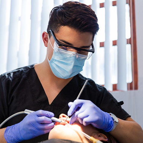 Dentist performing checkup for preventive dentistry in Greenwood Village