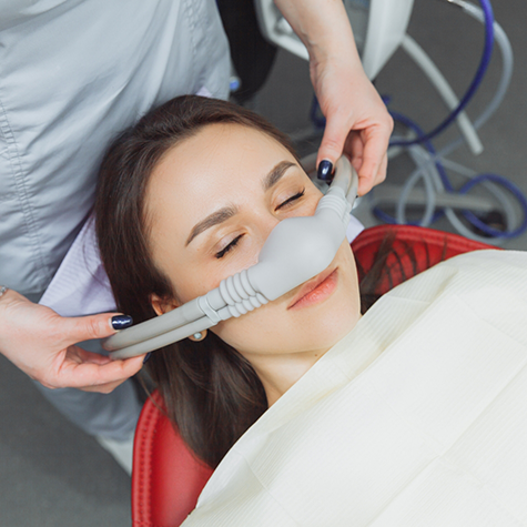 Relaxed dental patient with nasal mask